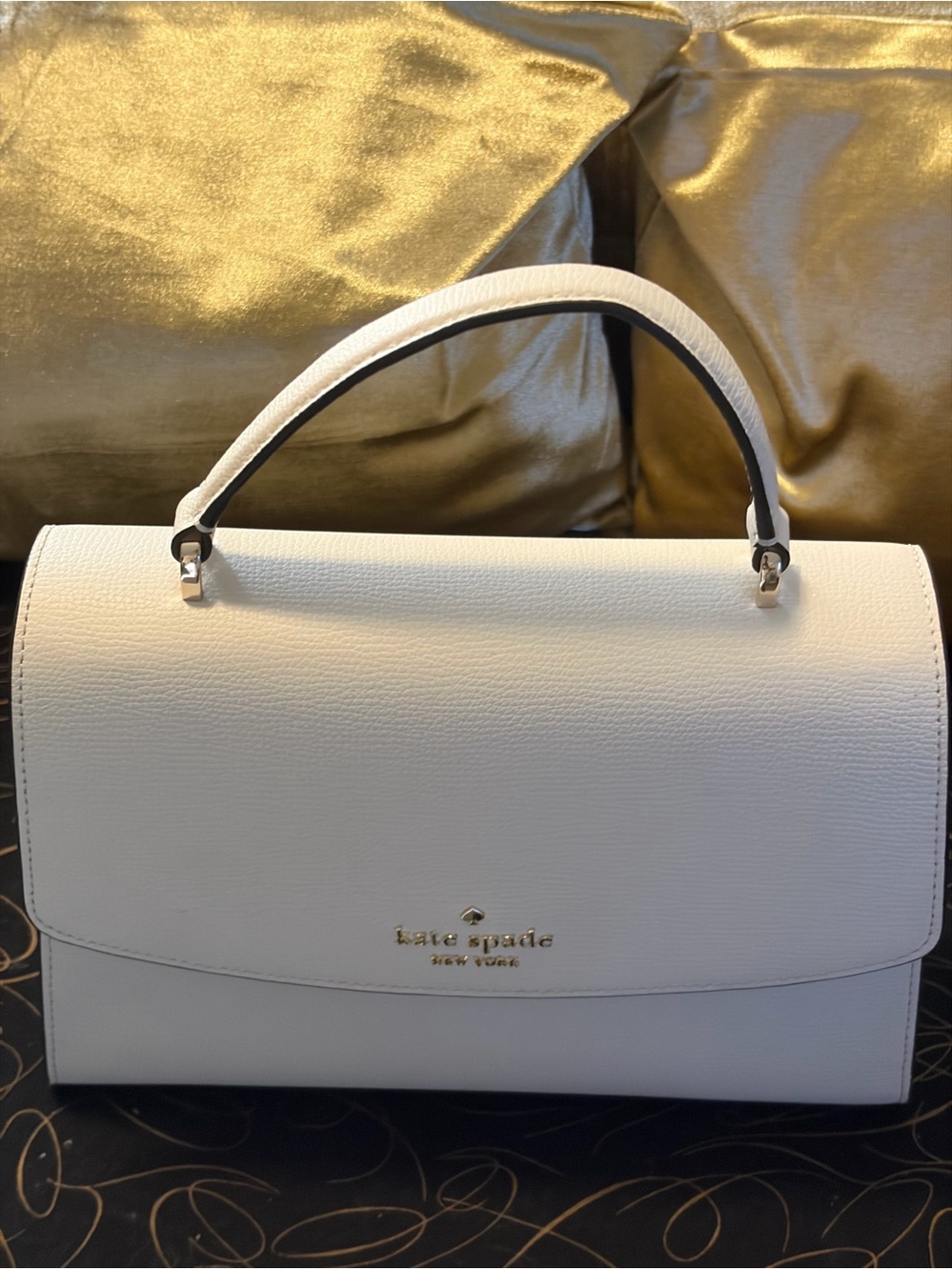 kate spade cream leather top-handle satchel with gold logo